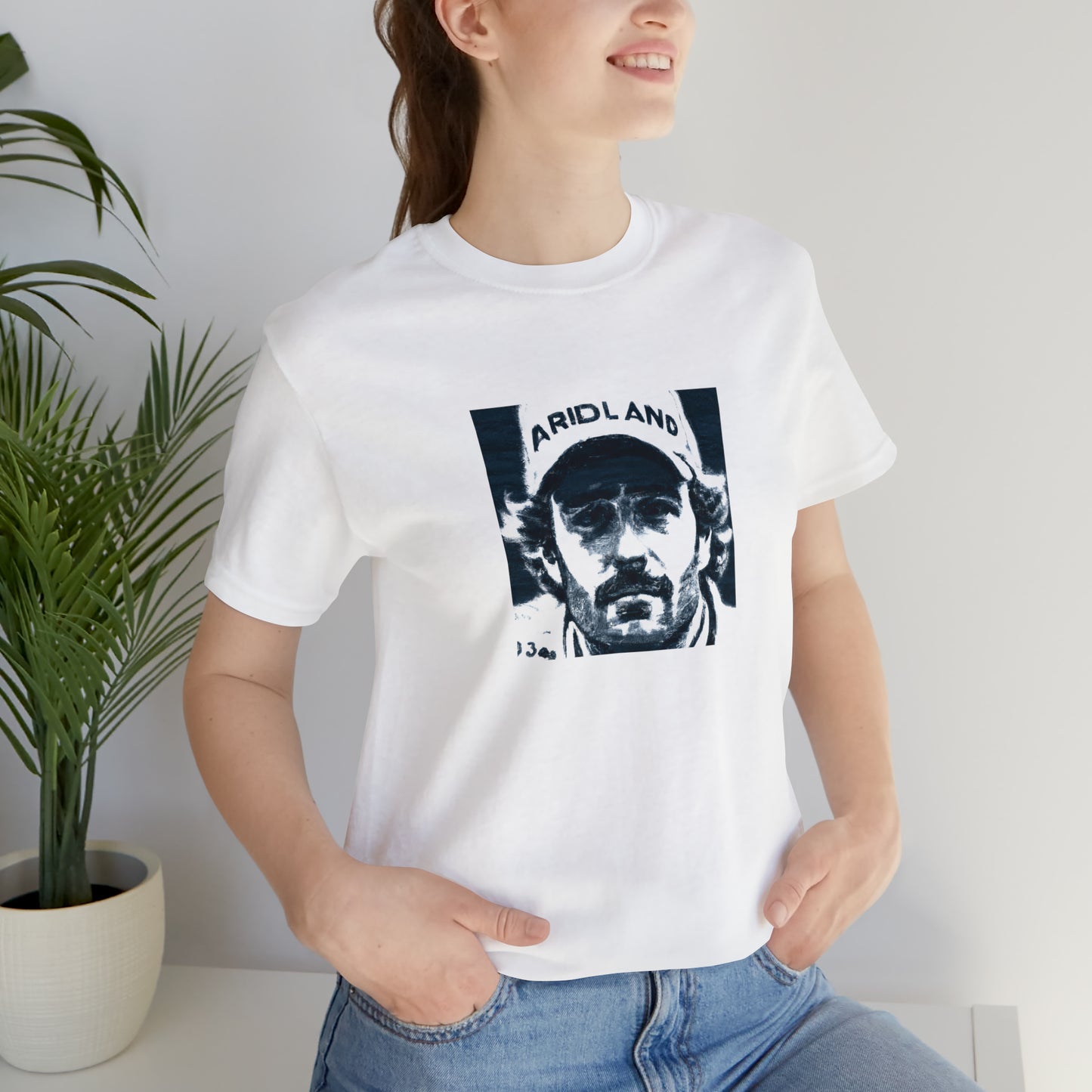 Marco Ricci, an Italian streetwear designer from the 1990s, is renowned for his grunge-inspired designs. His signature look features bold prints with a unique mix of textures, juxtaposing leather and denim for an unpredictable edge. His-Tee