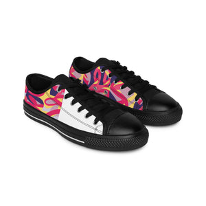 Name: Inés González
Place of Origin: Seville, Spain
Style: Creative and exuberant, combining traditional Spanish leather and metalwork with daring, daring colors and bold silhouettes.
Signature Designs-low top