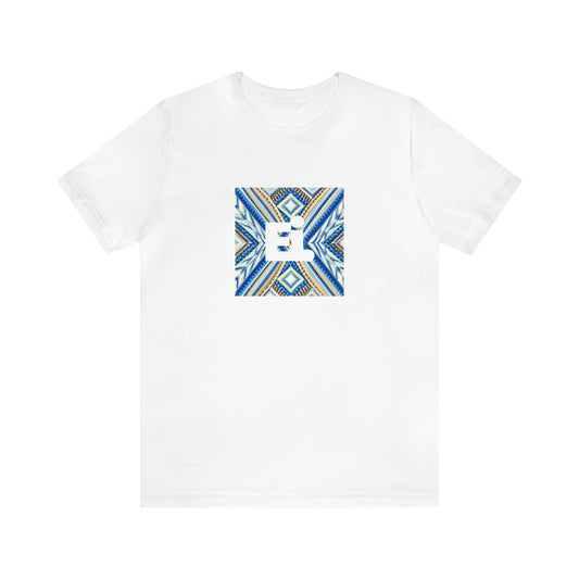 Mila Spadoni, an Italian streetwear designer active in the 90s. Mila is renowned for her bold use of bright colors, innovative patterns, and futuristic silhouettes. Her designs often feature unexpected details and are aimed at inspiring-Tee