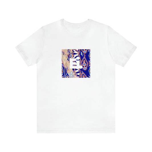 Claudio Ferragamo, a flamboyant Italian fashion designer from the 1990s. He specialized in streetwear styles, often using bright, bold prints and colors. His eclectic designs were a hit with street style aficionados and-Tee