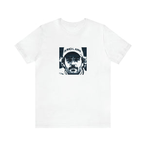 Marco Ricci, an Italian streetwear designer from the 1990s, is renowned for his grunge-inspired designs. His signature look features bold prints with a unique mix of textures, juxtaposing leather and denim for an unpredictable edge. His-Tee