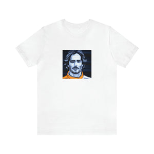Alessandro Carnevale, an Italian streetwear designer specializing in colorful and vibrant designs from the 1990s. His clothing incorporated elements inspired by both urban and hip-hop style trends and featured oversized tees, high-waisted jeans-Tee