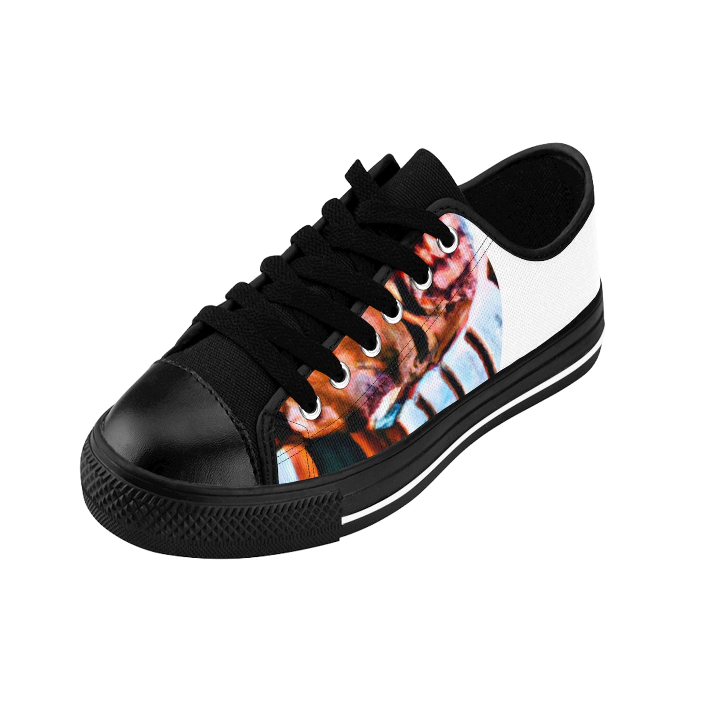 Miguel Vela, a renowned Spanish shoe designer from the late 1500s. He was renowned for his detailed and carefully crafted shoes, which were influenced by his mother's love for intricate embroidery and traditional Spanish designs. He paid-low top