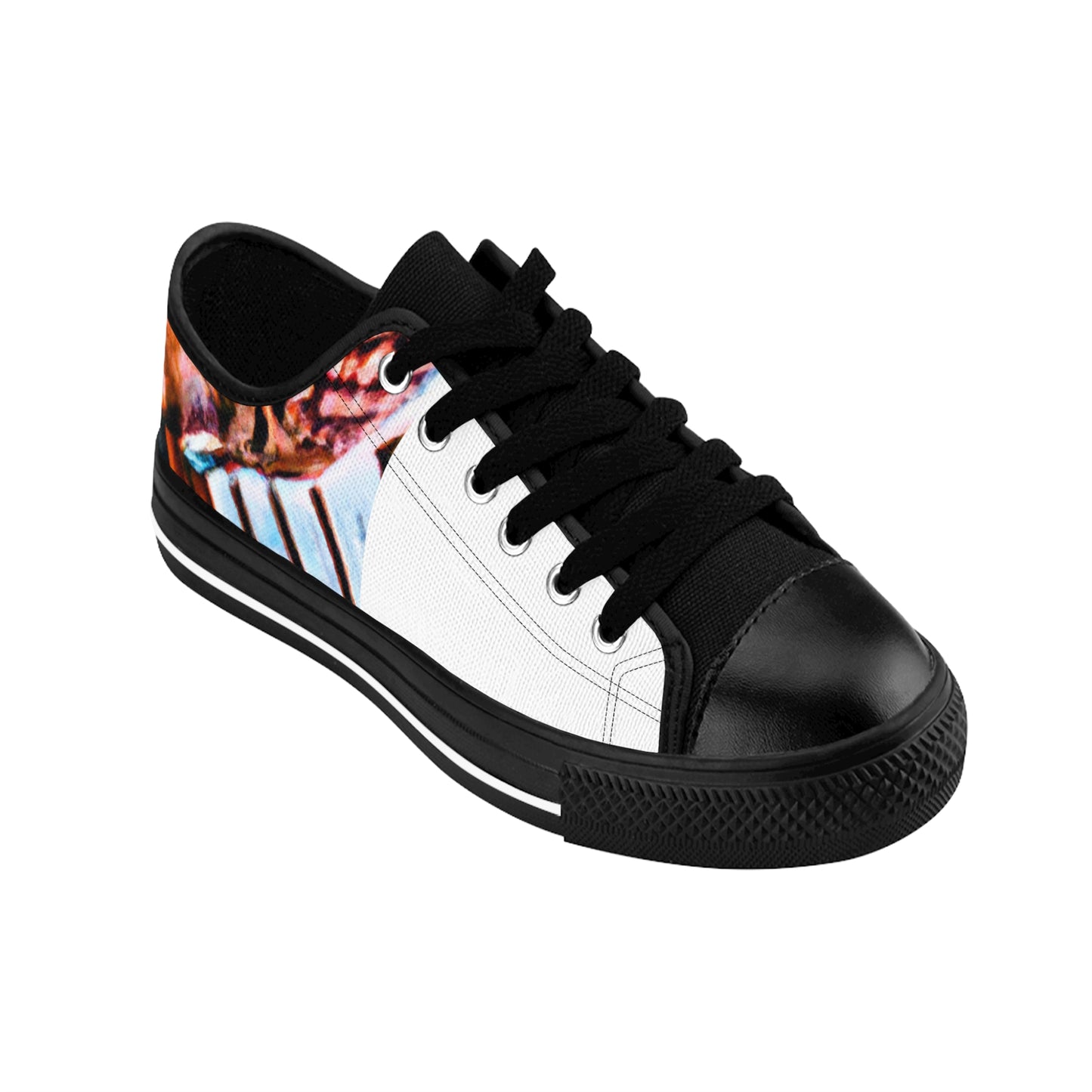 Miguel Vela, a renowned Spanish shoe designer from the late 1500s. He was renowned for his detailed and carefully crafted shoes, which were influenced by his mother's love for intricate embroidery and traditional Spanish designs. He paid-low top