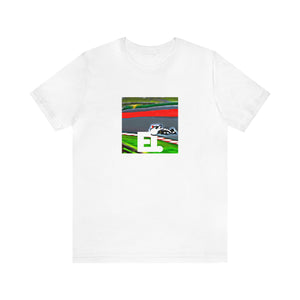 Hans Volante, a male Italian streetwear designer from the 1990s. He was known for his bold, innovative designs inspired by Italian street style, incorporating bright colors, whimsical prints, and daring silhouettes. His artwork often featured-Tee