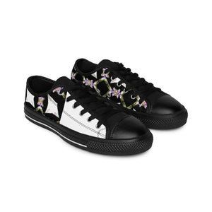 Miguel de Alarcón, a renowned shoe designer from 1550s Spain. With the support of the royal court, he revolutionized Spanish shoe designs with the introduction of elaborate and intricate embroidered laces and fabrics, which earned-low top