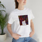 Silvia d'Agostino, an Italian streetwear designer from the 1990s who created edgy, rebellious clothing for both men and women. Her designs often featured bold colors and bright prints and aimed to push the boundaries of traditional street-Tee