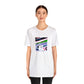 Scarlettina DiSerrafino, an iconic Italian streetwear designer from the 90s. She was known for her bold, colorful designs that combined traditional silhouettes with a modern edge, focusing on pieces that could be worn both on the-Tee