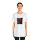 Giuliana Rancic, a female streetwear designer from Milan, Italy in the 1990s. She was known for her edgy and daring designs that made her a standout in the fashion world. Her vibrant prints, bold colors,-Tee