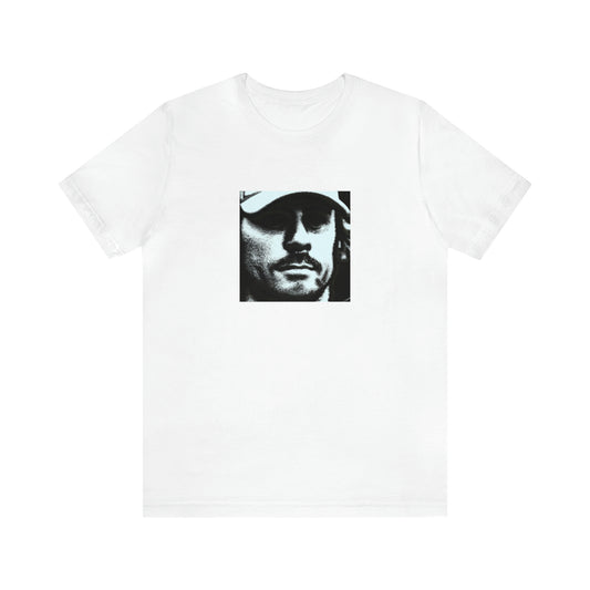 Nico Fabrizzio, a fashionable streetwear designer from Milan, Italy. He was known for his daring and innovative designs, often blending traditional Italian style with modern streetwear trends. He gained notoriety in the 1990s for his vibrant-Tee