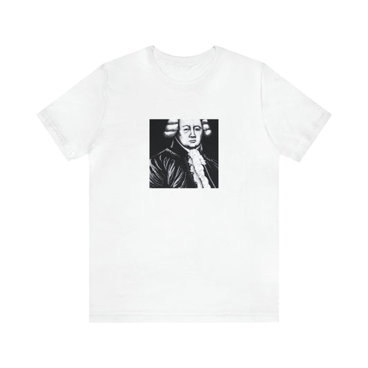 Lia Bitsoni, an elegant and avant-garde streetwear designer based out of Milan, Italy in the 1990s. She gained recognition for her signature silk wrap tops combined with wide-leg trousers for men and women, and-Tee