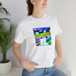 Luca Costa, a female streetwear designer from Milan, Italy who rose to fame in the late 90s. She specialized in bright, neon colors, bold graphic prints, and exaggerated silhouettes. Luca was known for her attention to-Tee