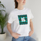 Alessandra Giordano, an Italian streetwear designer from the 1990s. She was known for her bold designs and bright colors, often inspired by pop culture icons from all over the world. She loved to experiment with different cuts and-Tee