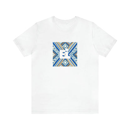 Mila Spadoni, an Italian streetwear designer active in the 90s. Mila is renowned for her bold use of bright colors, innovative patterns, and futuristic silhouettes. Her designs often feature unexpected details and are aimed at inspiring-Tee