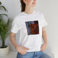 Giuliana Rancic, a female streetwear designer from Milan, Italy in the 1990s. She was known for her edgy and daring designs that made her a standout in the fashion world. Her vibrant prints, bold colors,-Tee