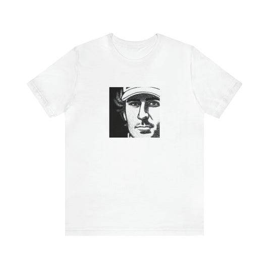 Gianni Valisi. He was a trendsetting designer from Florence, Italy in the 1990s who rose to fame for his unique approach to urban streetwear featuring bold color combinations, eye-catching silhouettes and intricate details. He was-Tee