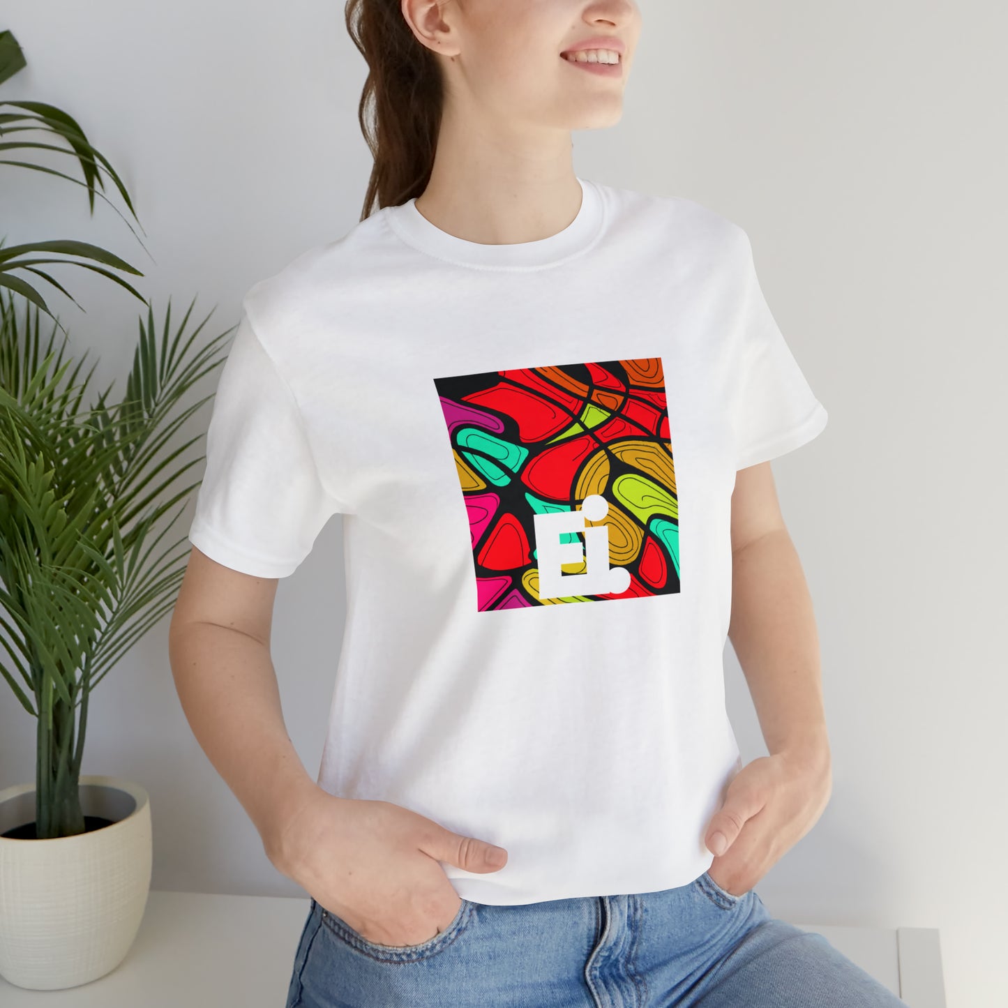 Giovanni Angelo, a flamboyant Italian streetwear designer in the 90s who was known for his wild use of color and bold prints. He favored loud and vivid patterns like stripes, florals, and chevrons-Tee