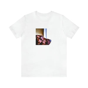 Gina Mirabella is an Italian streetwear designer from the 1990s. She is known for her iconic use of bold colors, graphic prints, and oversized silhouettes, exuding confidence and style. Her pieces are popular amongst young adults,-Tee