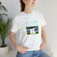 Giovanna Rossi, a female streetwear designer from Milan, Italy in the 1990s. She was known for her bold, vibrant designs, combining bold colors, boxy silhouettes, and '90s-inspired references. Giovanna-Tee